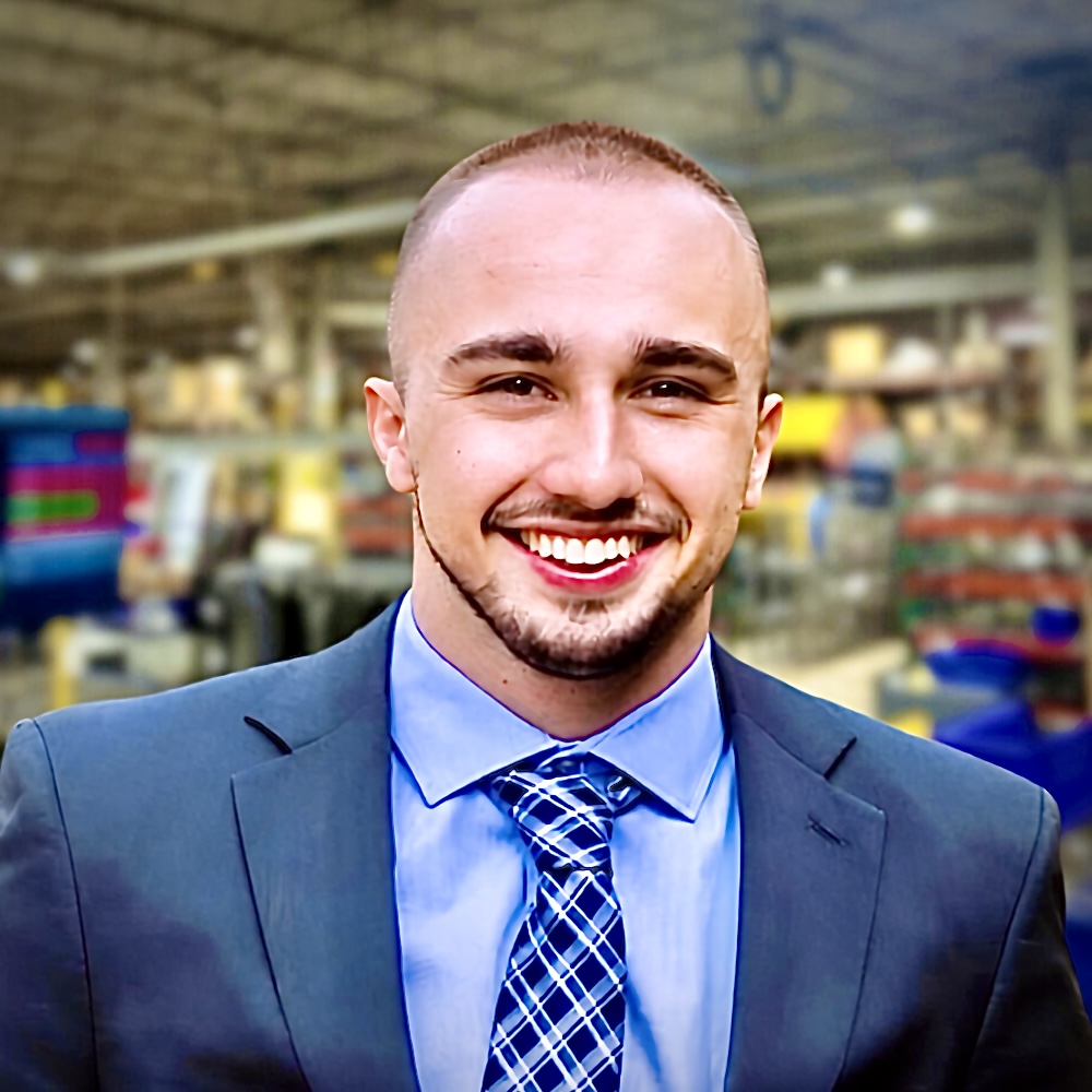 James Calcagni, engineer and manufacturing leader, on a factory floor
